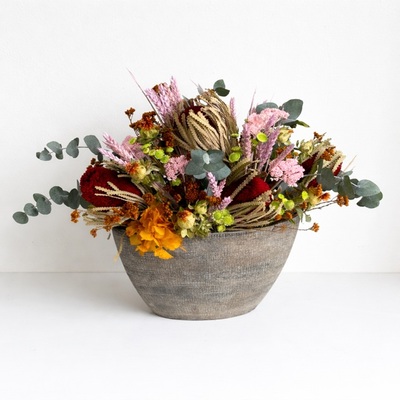 Centro de flores secas y preservadas en tonos rosados y granate – Regalo romántico en Avilés