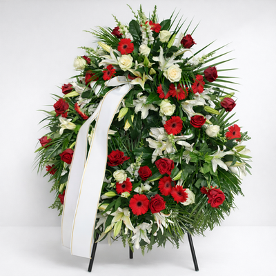 Corona funeraria de flores variadas